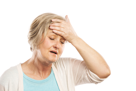 Senior woman has headache, isolated on white background