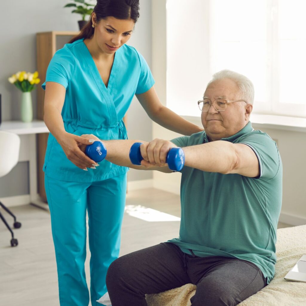 Nurse helping a male patient lift weights.