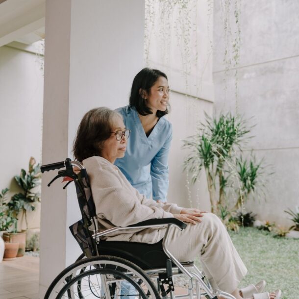 Caregiver sitting next to client