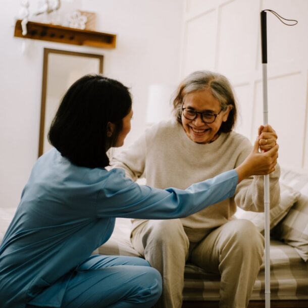 Caregiver helping patient